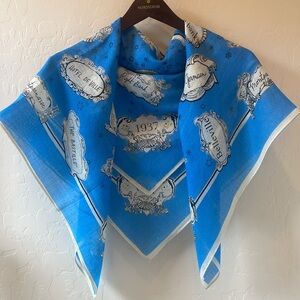 Madewell Paris-themed vivid blue and creme scarf with black script.